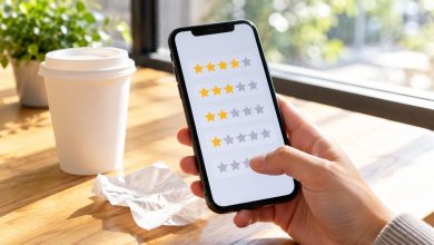 Phone showing a star-rating survey next to a receipt and a takeout cup